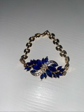 Girls Gold-Tone Bracelet with Deep Blue Crystal Flower Design